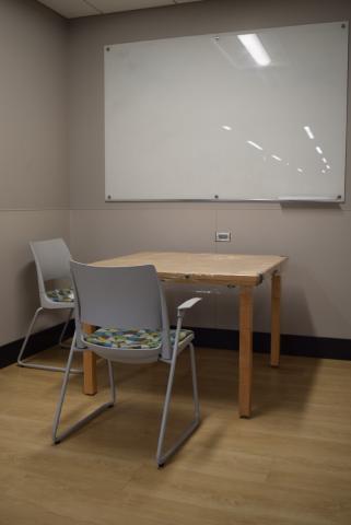Picture of study room with one table and two chairs.