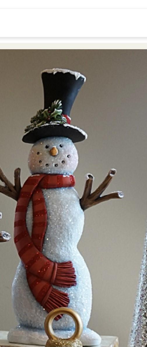 Photo of this month's Crafty Creations with Gilda. Snowman ceramic piece.