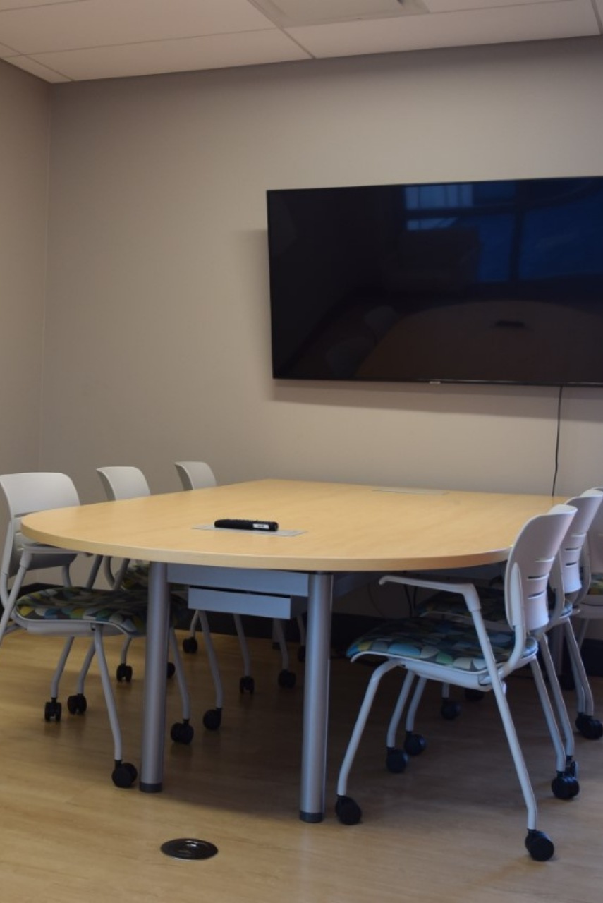 Picture of Group Collaboration Room with table, chairs, and TV monitor