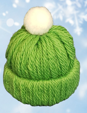 small green winter hat with light blue background and snowflakes