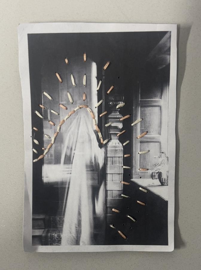 Ghost with cream and pink threads radiating